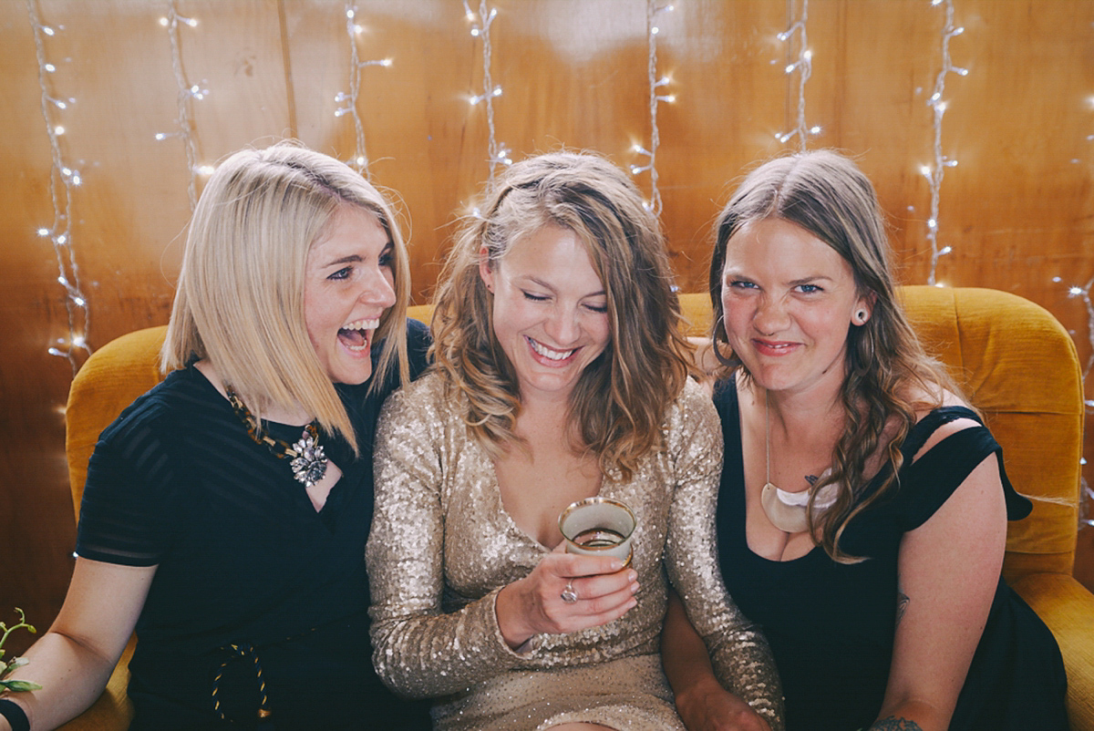 Amelia wore a gold sequin wedding dress for her relaxed, homespun and handmade wedding by the seaside in New Zealand. Photography by Sarah Burton.