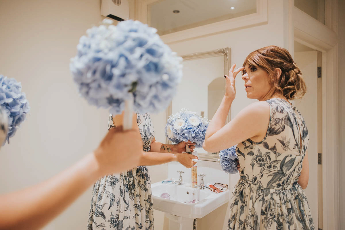 Bride Faye wears an 1930's inspired drop waist glamorous dress by Eliza jane Howell for her effortlessly elegant summer garden party wedding.