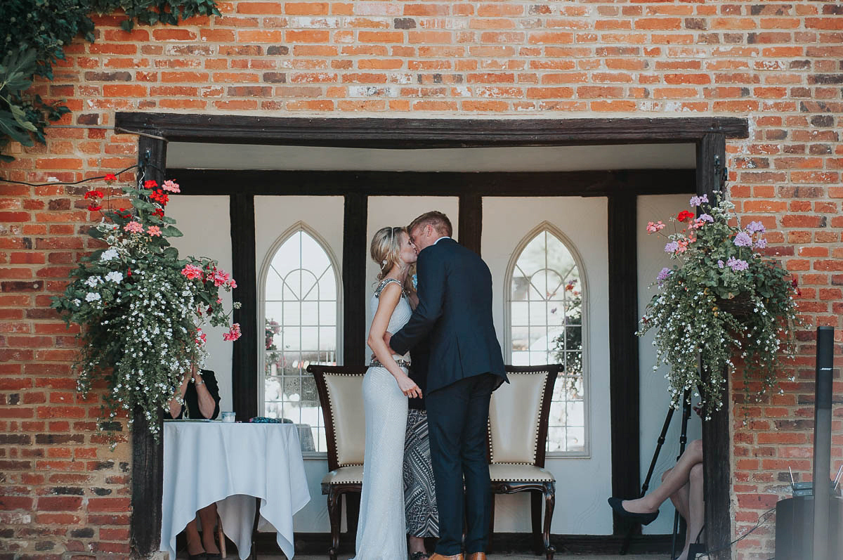 Bride Faye wears an 1930's inspired drop waist glamorous dress by Eliza jane Howell for her effortlessly elegant summer garden party wedding.