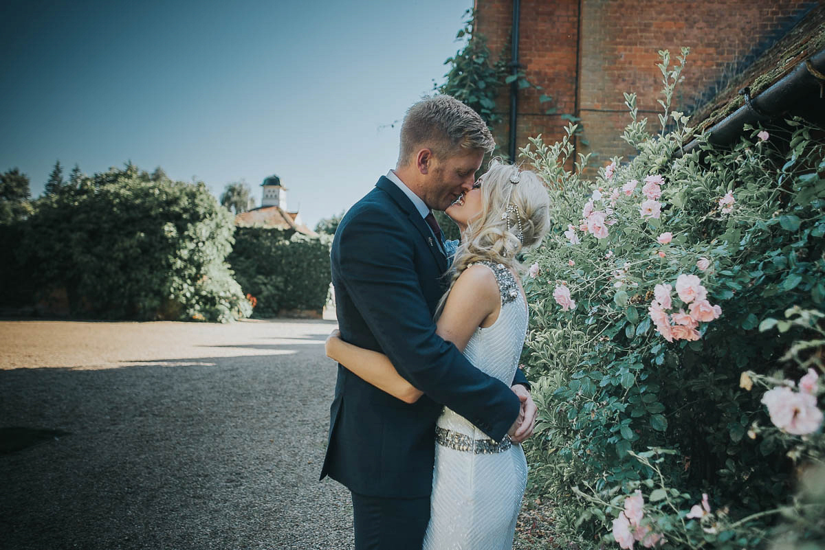 Bride Faye wears an 1930's inspired drop waist glamorous dress by Eliza jane Howell for her effortlessly elegant summer garden party wedding.