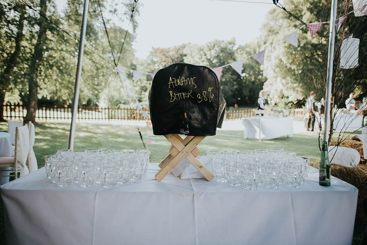 Bride Faye wears an 1930's inspired drop waist glamorous dress by Eliza jane Howell for her effortlessly elegant summer garden party wedding.