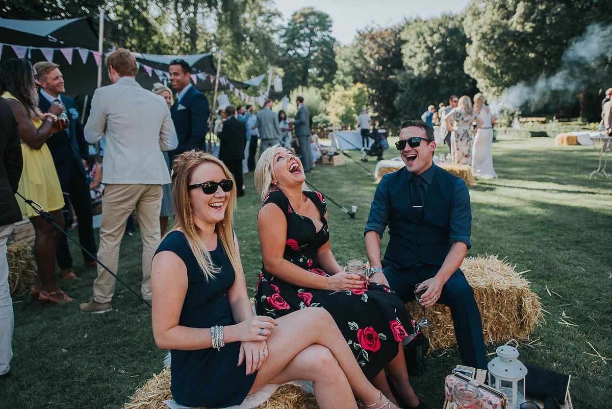 Bride Faye wears an 1930's inspired drop waist glamorous dress by Eliza jane Howell for her effortlessly elegant summer garden party wedding.