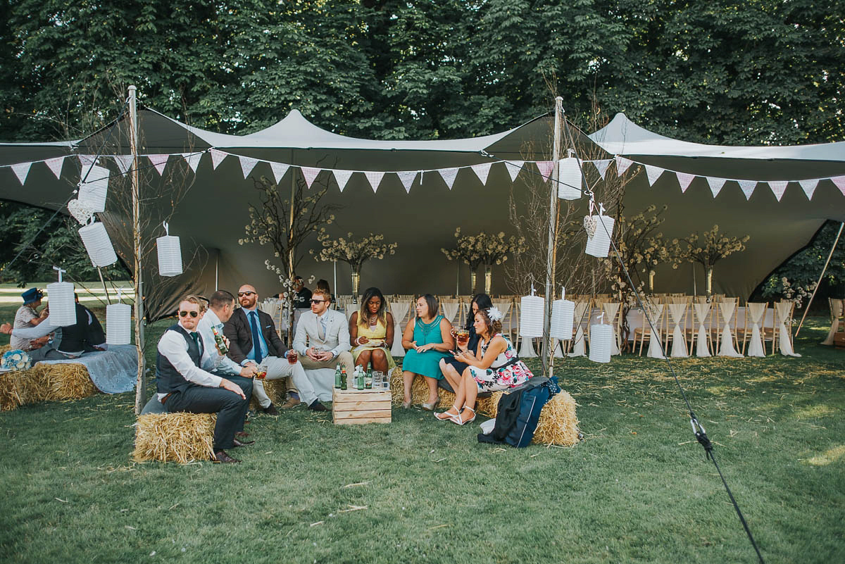 Bride Faye wears an 1930's inspired drop waist glamorous dress by Eliza jane Howell for her effortlessly elegant summer garden party wedding.