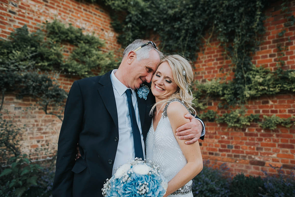 Bride Faye wears an 1930's inspired drop waist glamorous dress by Eliza jane Howell for her effortlessly elegant summer garden party wedding.