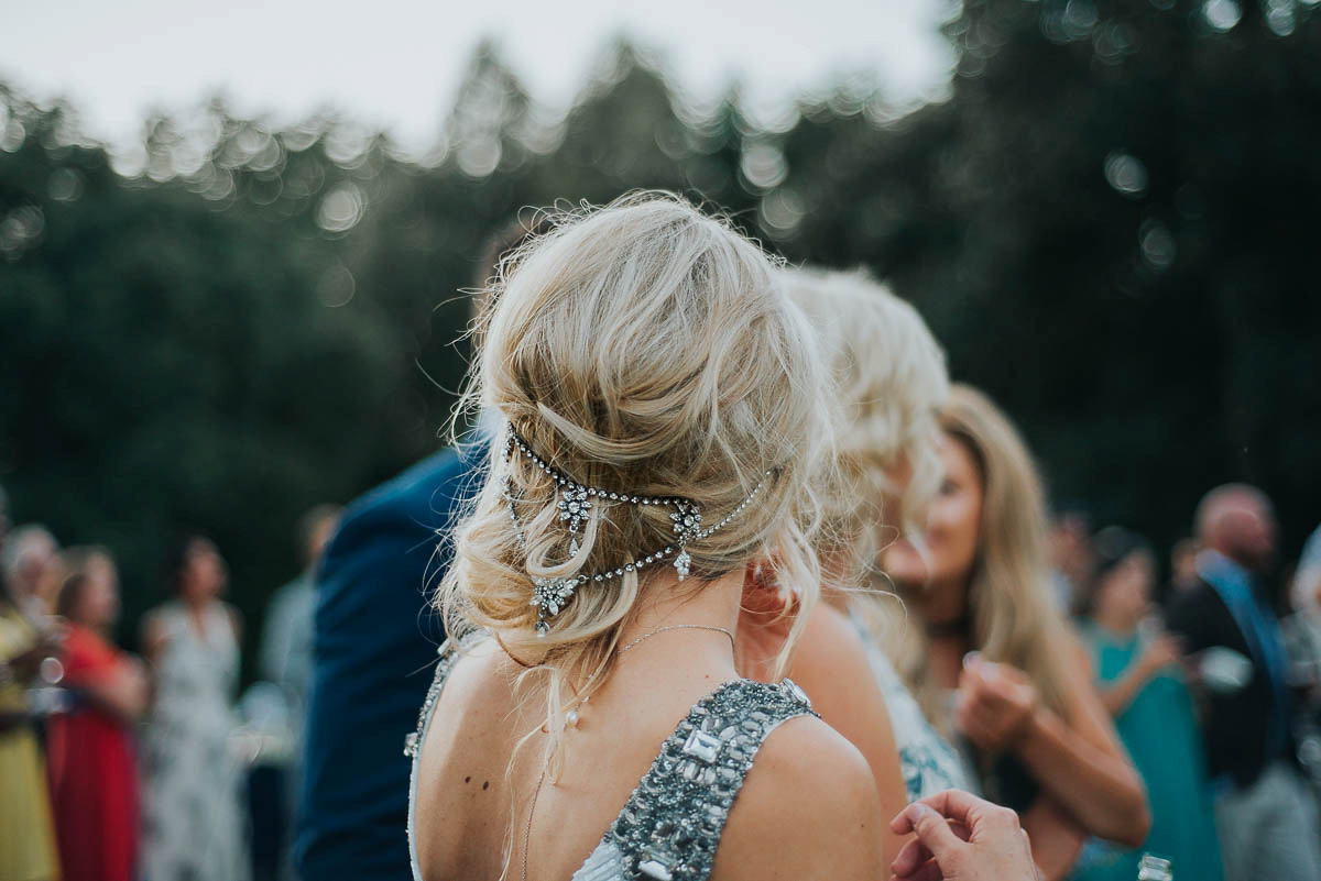 Bride Faye wears an 1930's inspired drop waist glamorous dress by Eliza jane Howell for her effortlessly elegant summer garden party wedding.