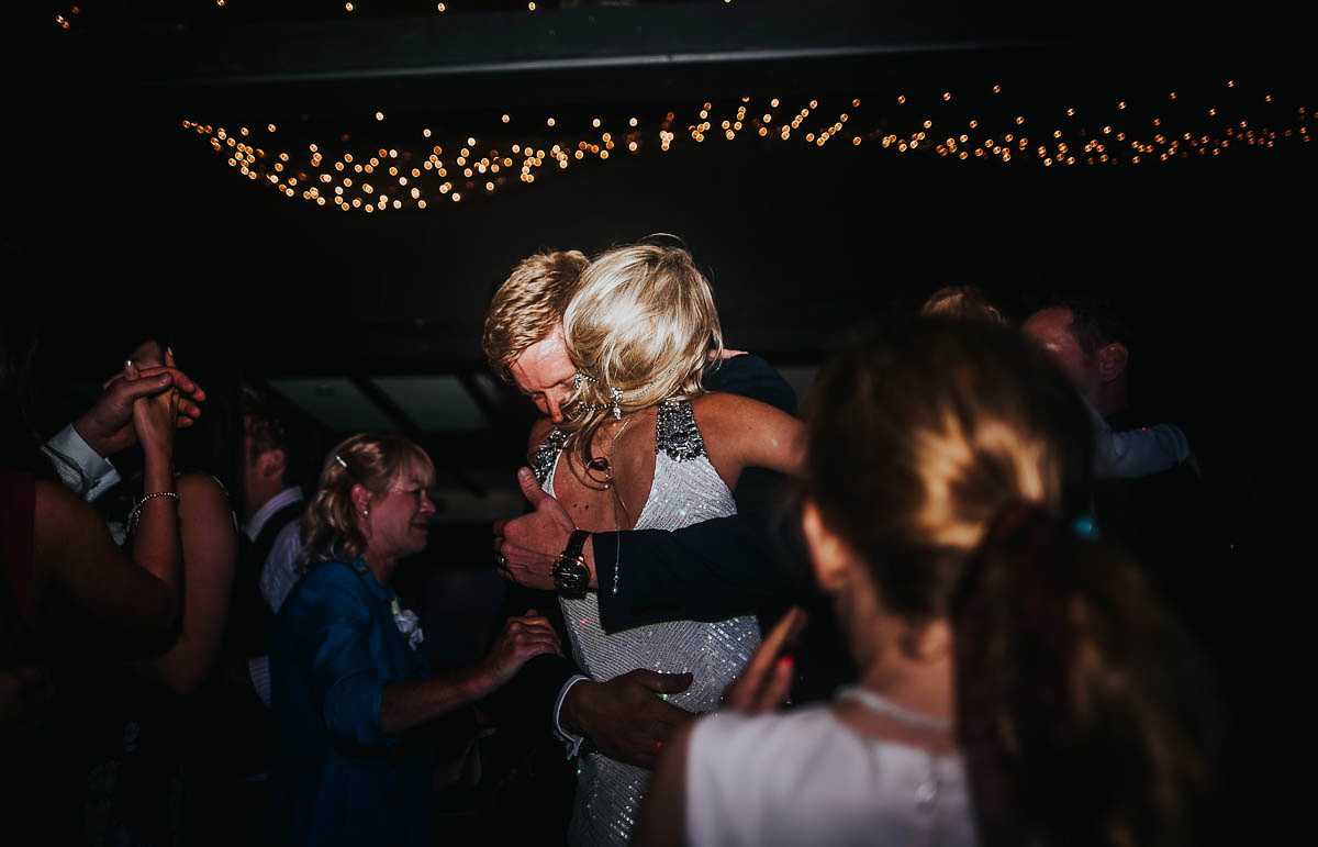 Bride Faye wears an 1930's inspired drop waist glamorous dress by Eliza jane Howell for her effortlessly elegant summer garden party wedding.