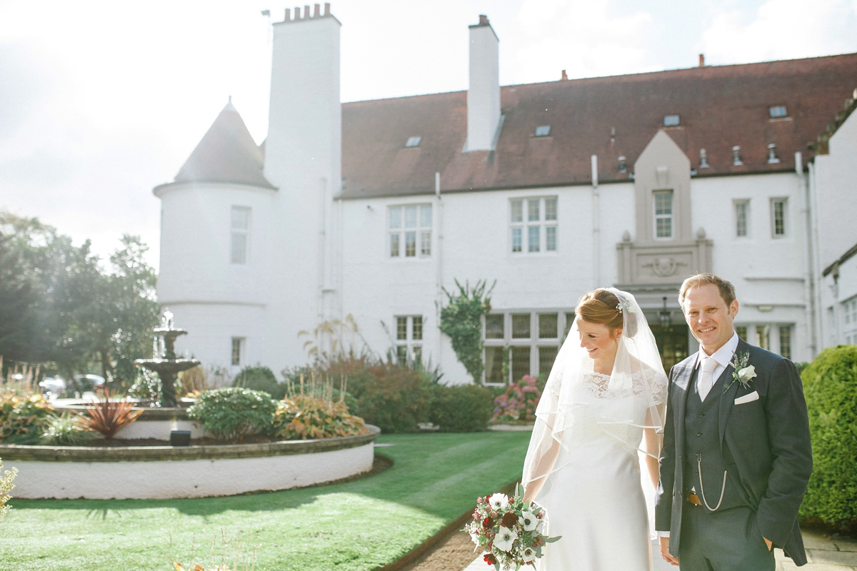 Laura wore a Charlotte Balbier gown for her elegant Autumn wedding at Lochgreen House in Ayrshire, Scotland. Photography by The Gibsons.