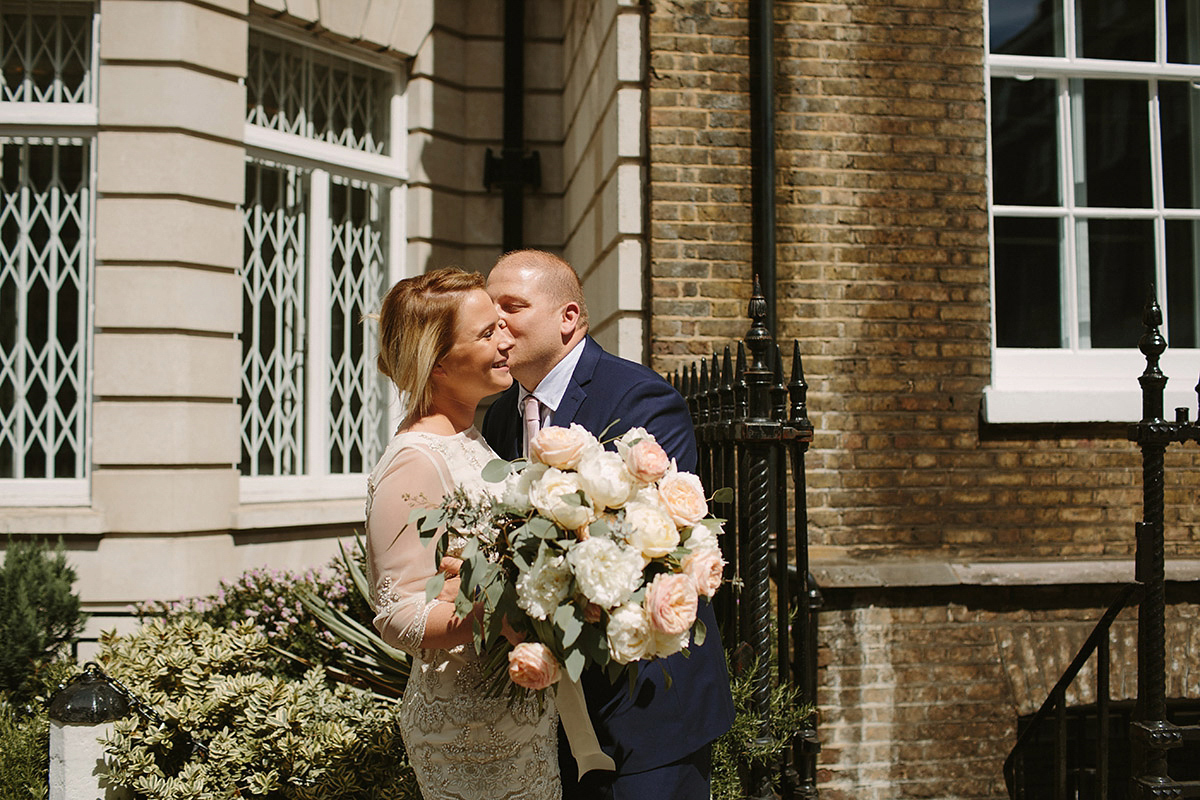 Helaina wore a short, beaded dress from Monsoon for her Westminster wedding. Photography by Emilie White. Helaina and Dan had a larger wedding celebration in France and we'll be sharing those images on Sunday 8th January 2017.