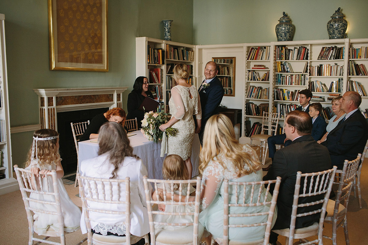 Helaina wore a short, beaded dress from Monsoon for her Westminster wedding. Photography by Emilie White. Helaina and Dan had a larger wedding celebration in France and we'll be sharing those images on Sunday 8th January 2017.