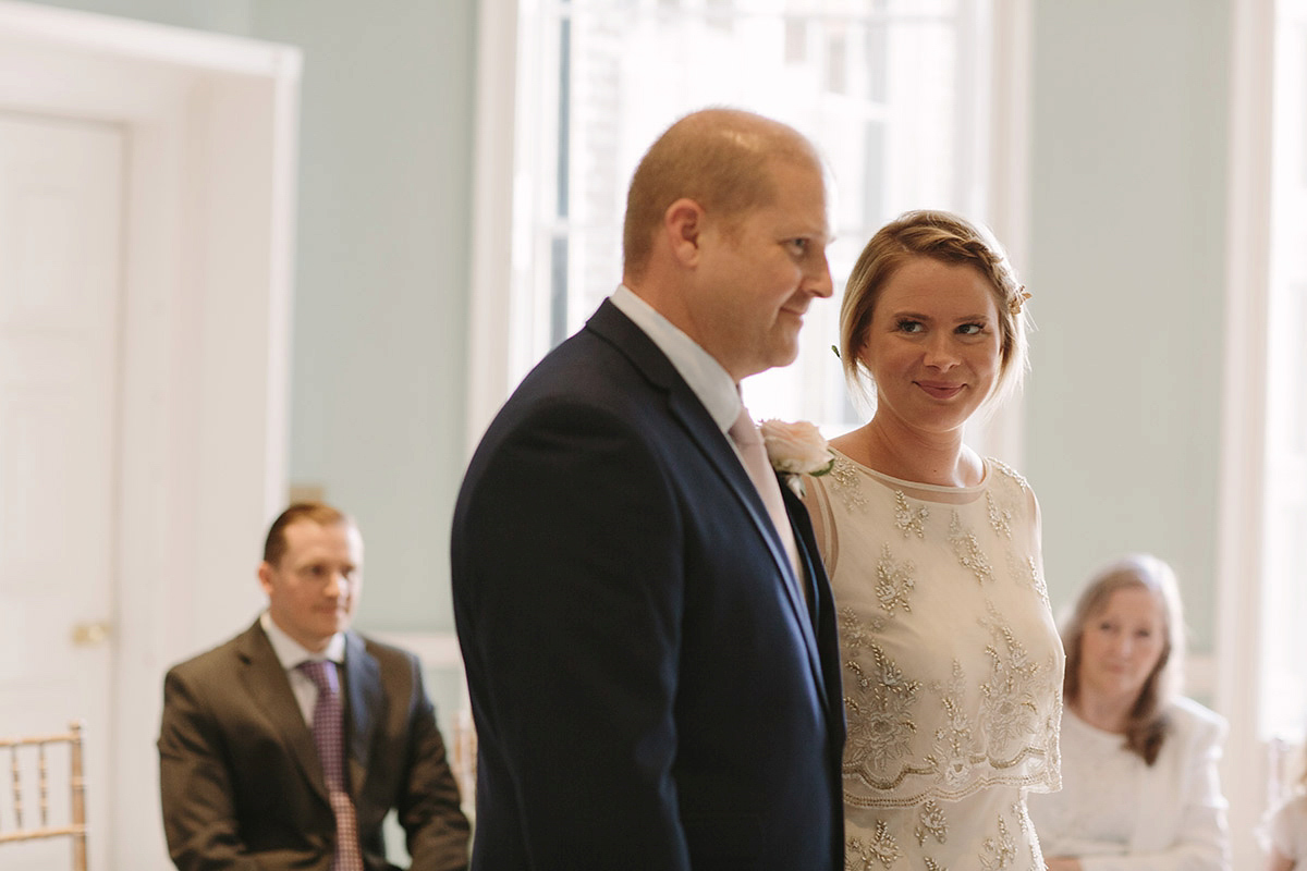 Helaina wore a short, beaded dress from Monsoon for her Westminster wedding. Photography by Emilie White. Helaina and Dan had a larger wedding celebration in France and we'll be sharing those images on Sunday 8th January 2017.