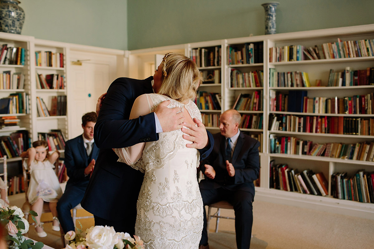 Helaina wore a short, beaded dress from Monsoon for her Westminster wedding. Photography by Emilie White. Helaina and Dan had a larger wedding celebration in France and we'll be sharing those images on Sunday 8th January 2017.