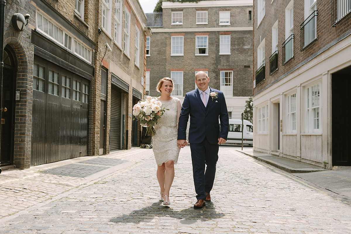 Helaina wore a short, beaded dress from Monsoon for her Westminster wedding. Photography by Emilie White. Helaina and Dan had a larger wedding celebration in France and we'll be sharing those images on Sunday 8th January 2017.