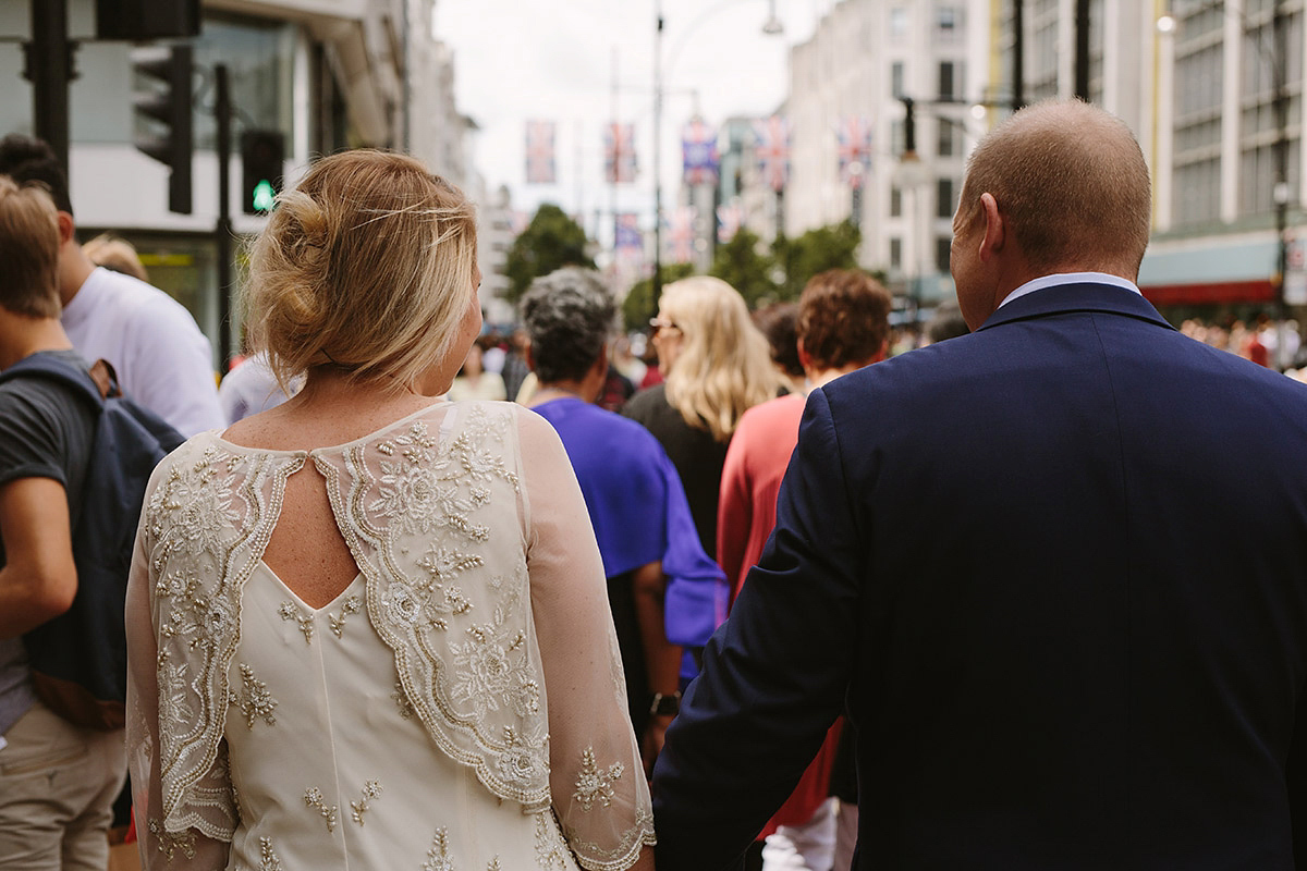 Helaina wore a short, beaded dress from Monsoon for her Westminster wedding. Photography by Emilie White. Helaina and Dan had a larger wedding celebration in France and we'll be sharing those images on Sunday 8th January 2017.