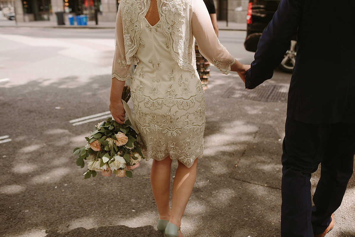 Helaina wore a short, beaded dress from Monsoon for her Westminster wedding. Photography by Emilie White. Helaina and Dan had a larger wedding celebration in France and we'll be sharing those images on Sunday 8th January 2017.