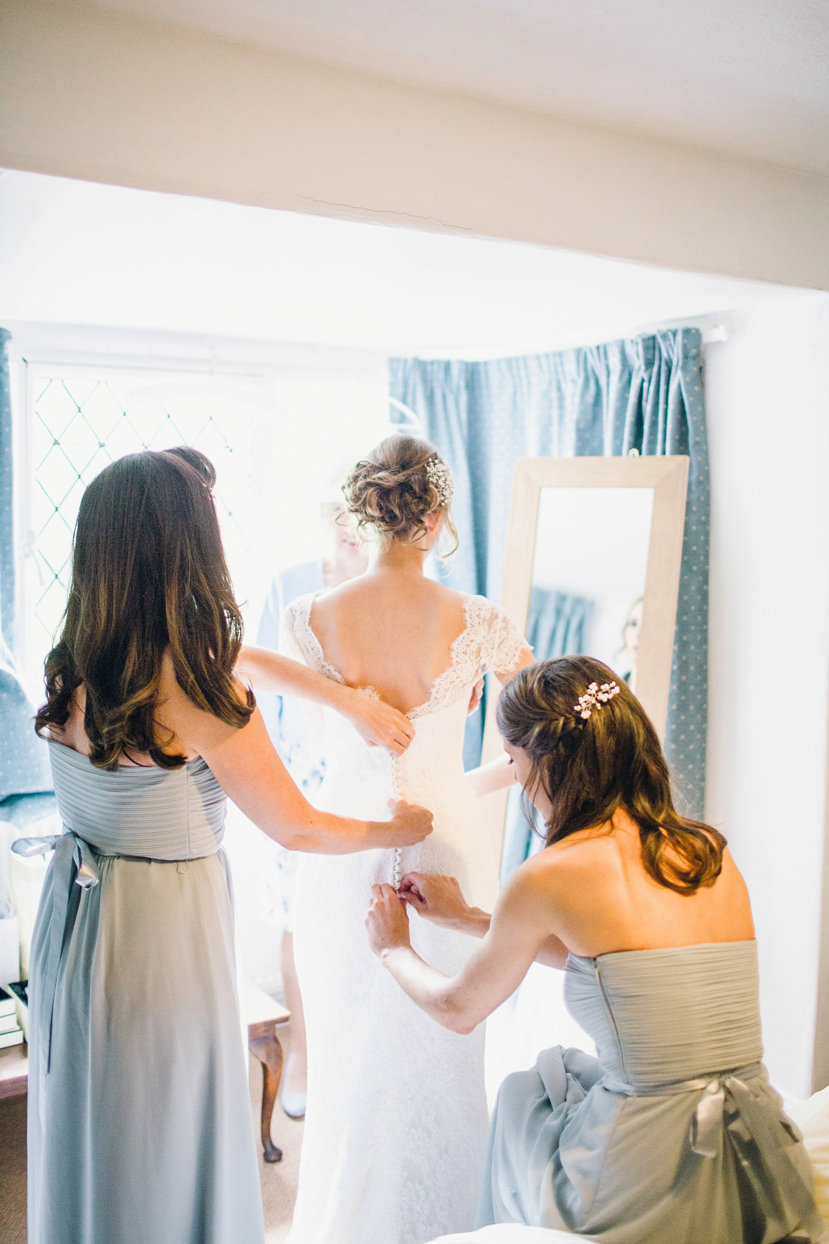 Kirsty wore a Stewart Parvin gown for her elegant and charming English Lake District wedding. Photography by Jessica Reeve.