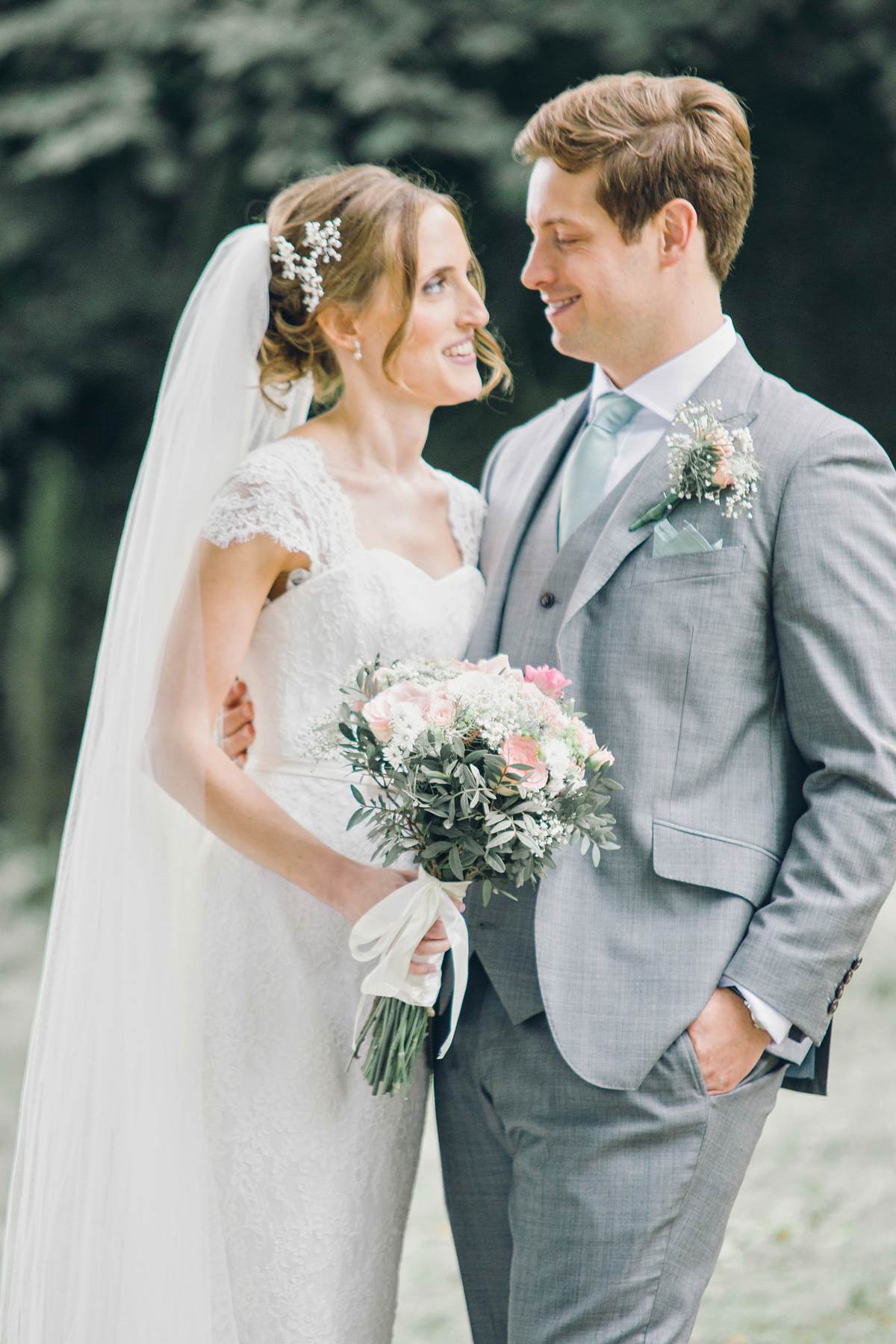 Kirsty wore a Stewart Parvin gown for her elegant and charming English Lake District wedding. Photography by Jessica Reeve.