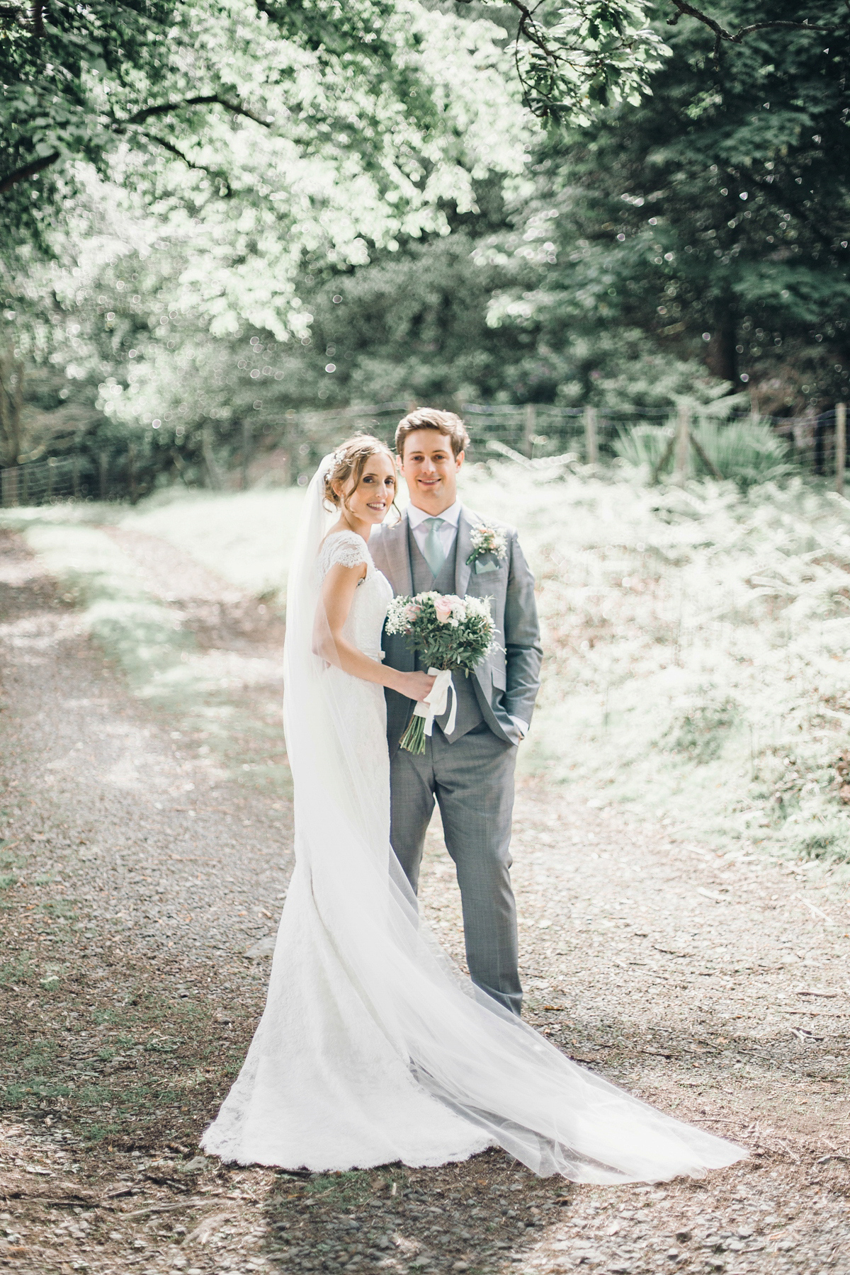 Kirsty wore a Stewart Parvin gown for her elegant and charming English Lake District wedding. Photography by Jessica Reeve.