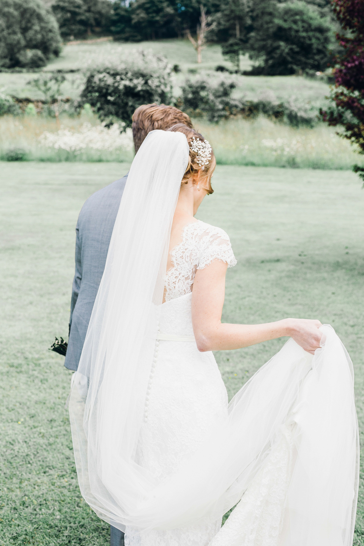 Kirsty wore a Stewart Parvin gown for her elegant and charming English Lake District wedding. Photography by Jessica Reeve.