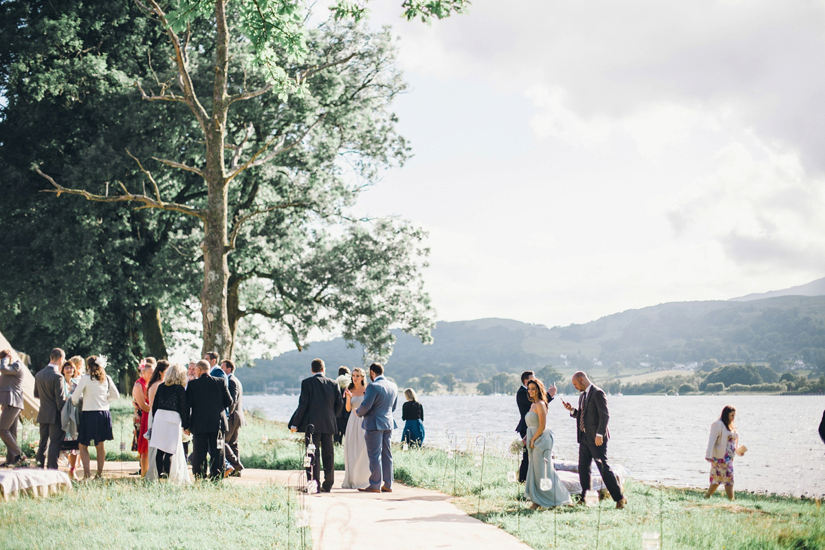 Kirsty wore a Stewart Parvin gown for her elegant and charming English Lake District wedding. Photography by Jessica Reeve.