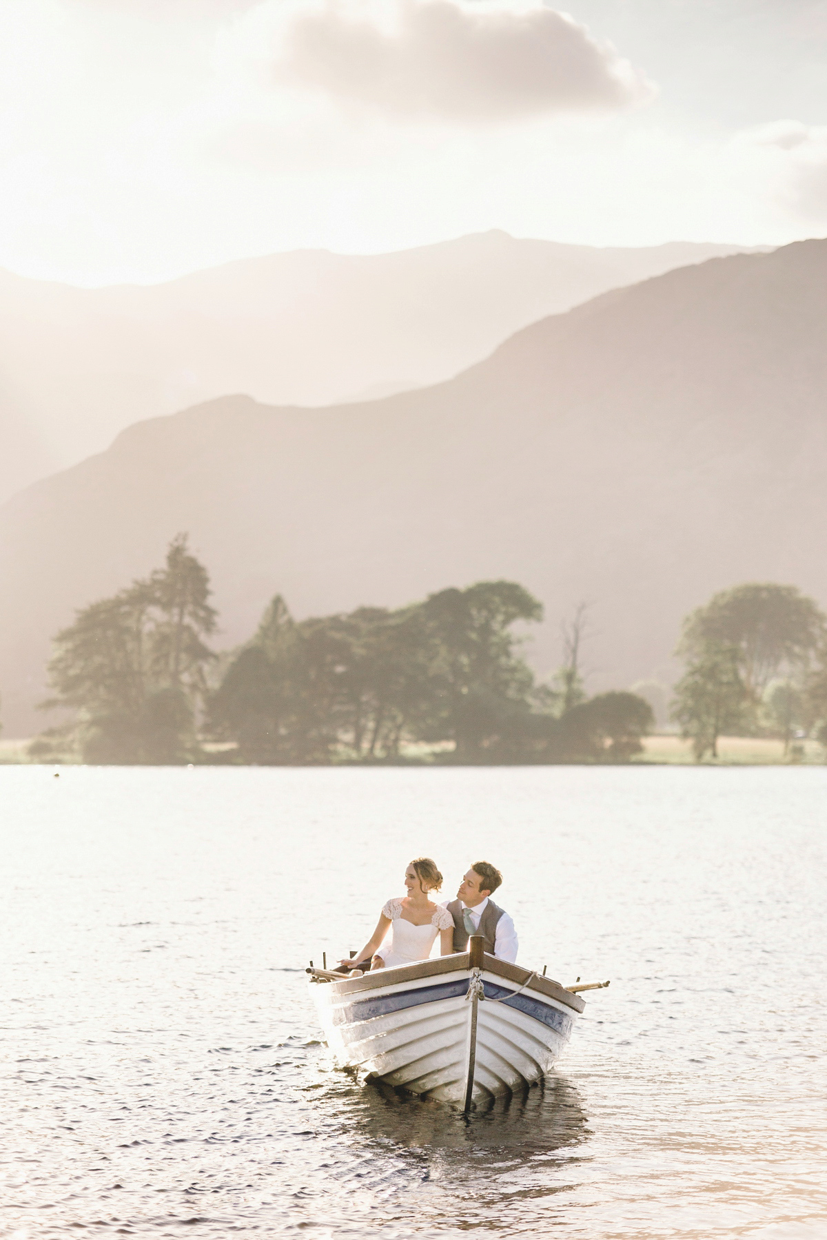 Kirsty wore a Stewart Parvin gown for her elegant and charming English Lake District wedding. Photography by Jessica Reeve.