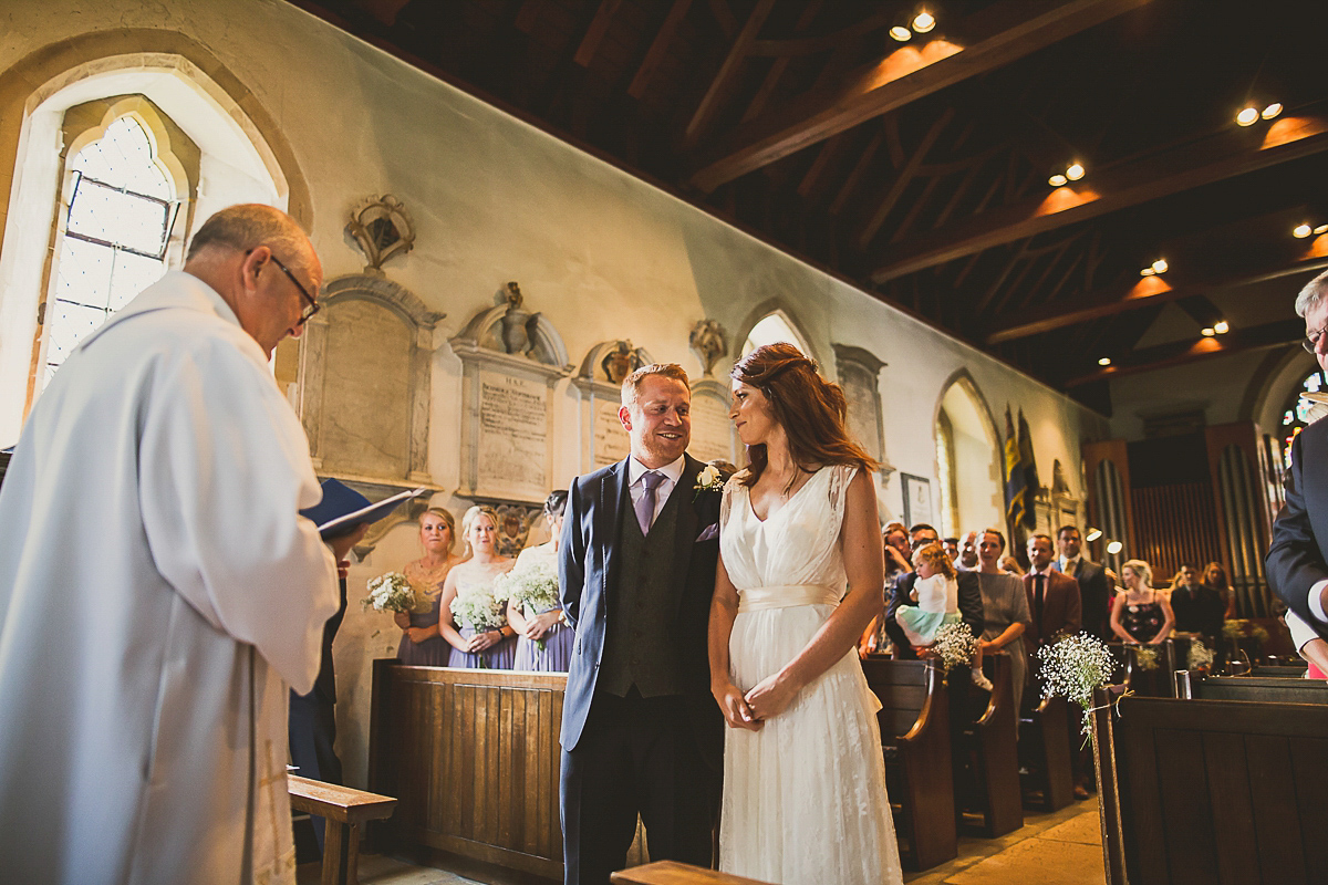 Ashleigh wore an elegant Charlie Brear gown for her sunshine and sunflower filled wedding. A Mariachi band entertained guests at the reception. Bridesmaids wore ASOS. Photography by The Springles.