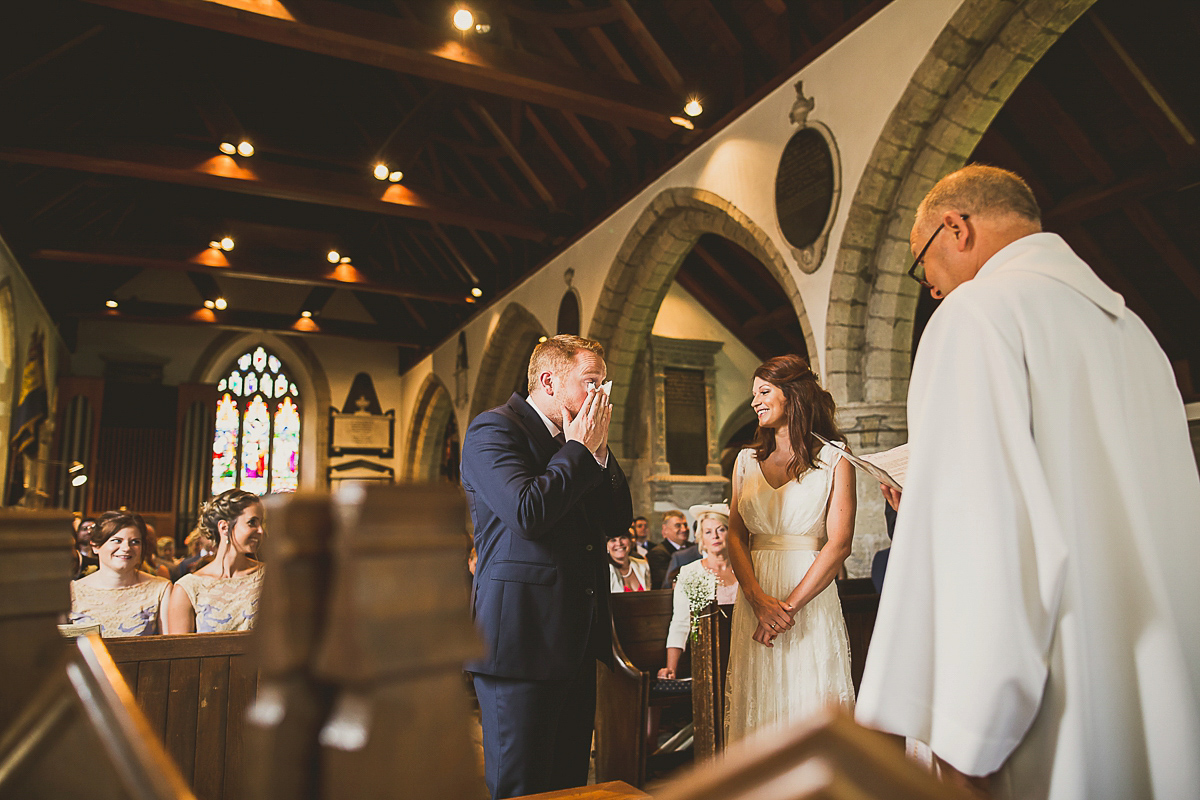 Ashleigh wore an elegant Charlie Brear gown for her sunshine and sunflower filled wedding. A Mariachi band entertained guests at the reception. Bridesmaids wore ASOS. Photography by The Springles.