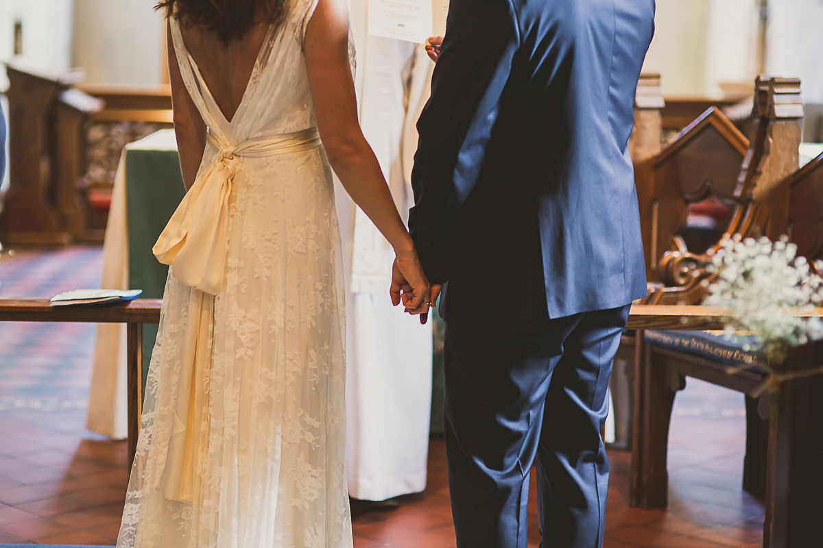 Ashleigh wore an elegant Charlie Brear gown for her sunshine and sunflower filled wedding. A Mariachi band entertained guests at the reception. Bridesmaids wore ASOS. Photography by The Springles.