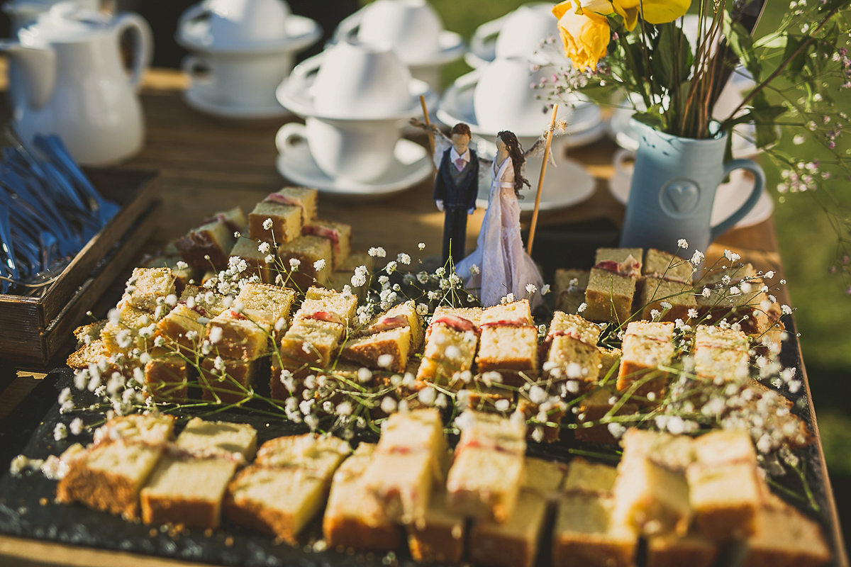 Ashleigh wore an elegant Charlie Brear gown for her sunshine and sunflower filled wedding. A Mariachi band entertained guests at the reception. Bridesmaids wore ASOS. Photography by The Springles.