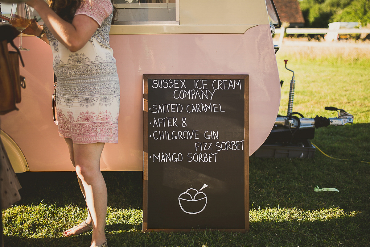 Ashleigh wore an elegant Charlie Brear gown for her sunshine and sunflower filled wedding. A Mariachi band entertained guests at the reception. Bridesmaids wore ASOS. Photography by The Springles.