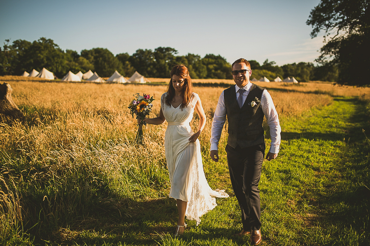 Ashleigh wore an elegant Charlie Brear gown for her sunshine and sunflower filled wedding. A Mariachi band entertained guests at the reception. Bridesmaids wore ASOS. Photography by The Springles.