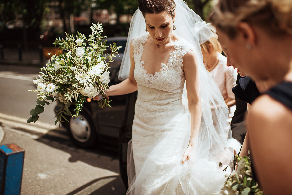 Beth wore a Watters gown and carried an all-white bouquet for her effortlessly elegant, cool, modern and stylish London wedding. Images captured by Wheels & Co Photography.