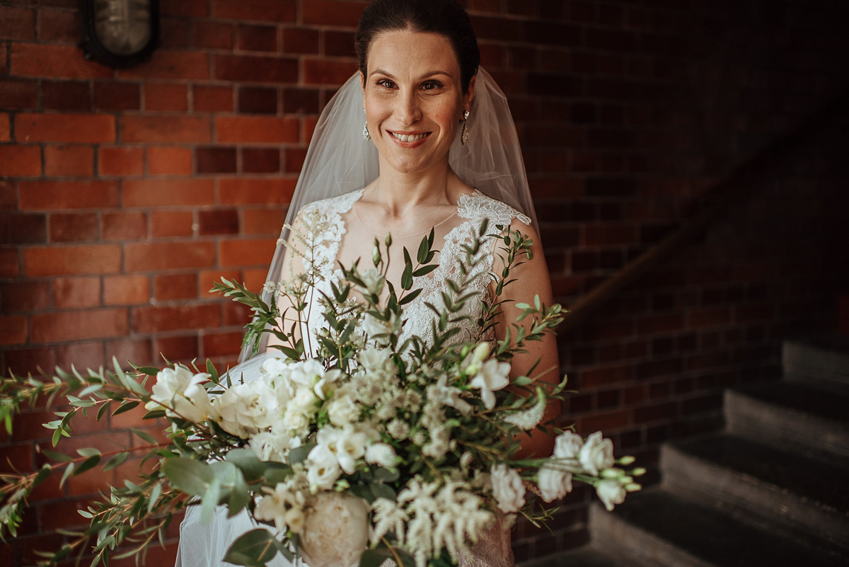 Beth wore a Watters gown and carried an all-white bouquet for her effortlessly elegant, cool, modern and stylish London wedding. Images captured by Wheels & Co Photography. Beth wore a Watters gown and carried an all-white bouquet for her effortlessly elegant, cool, modern and stylish London wedding. Images captured by Wheels & Co Photography.