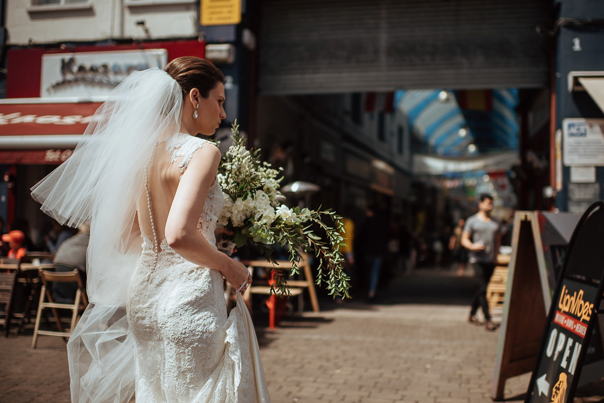 Beth wore a Watters gown and carried an all-white bouquet for her effortlessly elegant, cool, modern and stylish London wedding. Images captured by Wheels & Co Photography. Beth wore a Watters gown and carried an all-white bouquet for her effortlessly elegant, cool, modern and stylish London wedding. Images captured by Wheels & Co Photography.