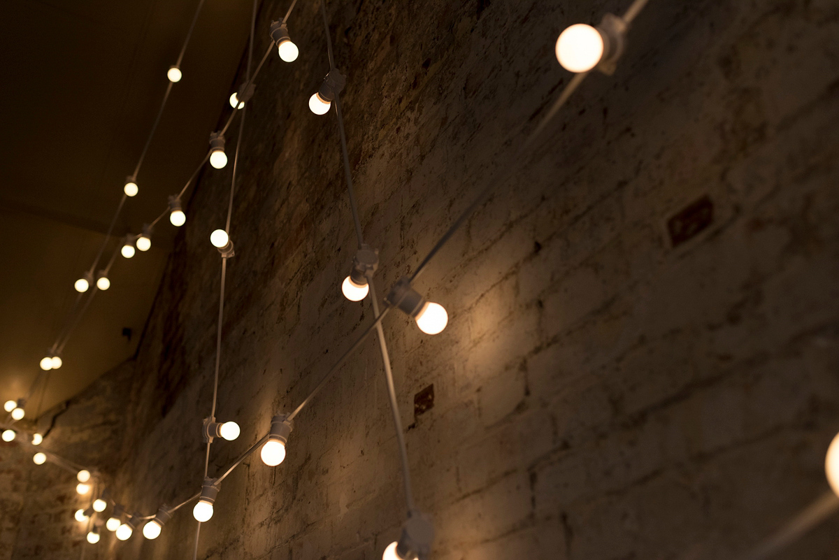 Ruth wore a J.Crew dress for her modern, cool, London warehouse wedding. Photography by Thierry Joubert.