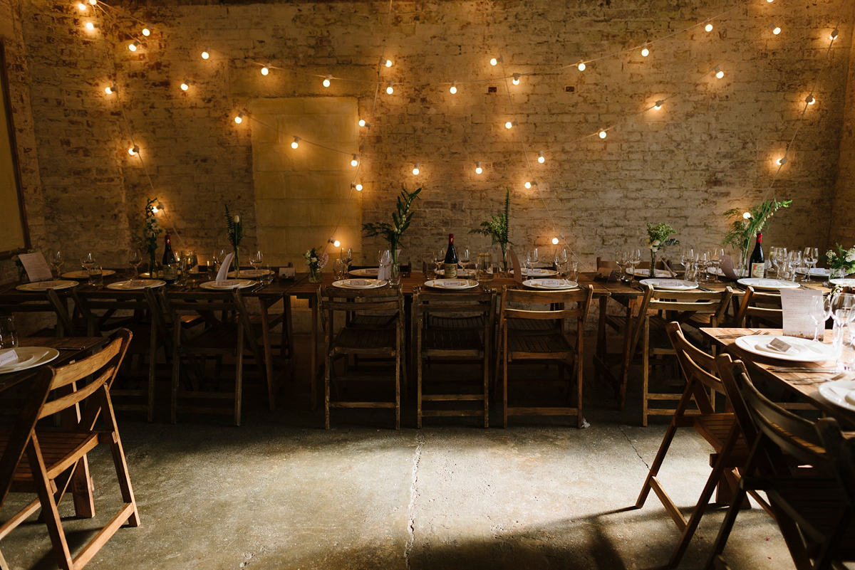 Ruth wore a J.Crew dress for her modern, cool, London warehouse wedding. Photography by Thierry Joubert.