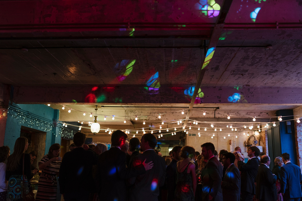 Ruth wore a J.Crew dress for her modern, cool, London warehouse wedding. Photography by Thierry Joubert.