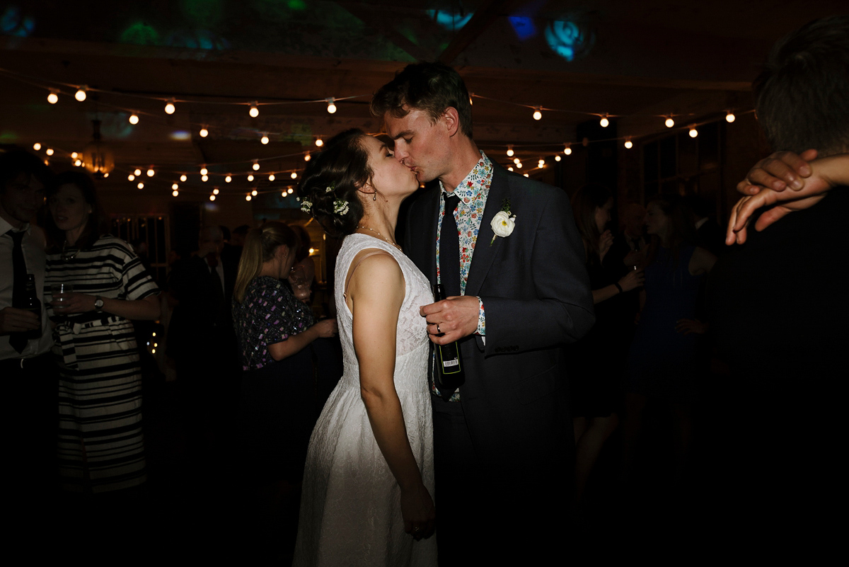 Ruth wore a J.Crew dress for her modern, cool, London warehouse wedding. Photography by Thierry Joubert.