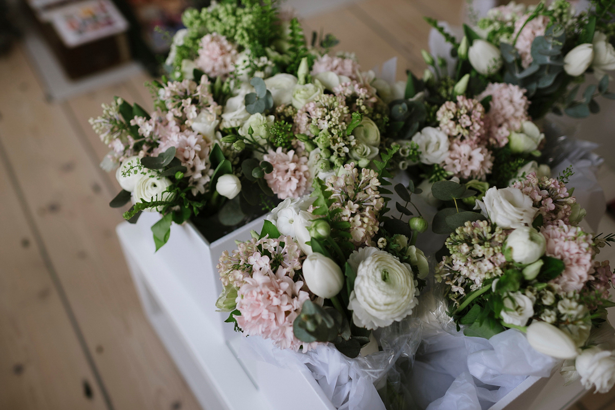 Ruth wore a J.Crew dress for her modern, cool, London warehouse wedding. Photography by Thierry Joubert.