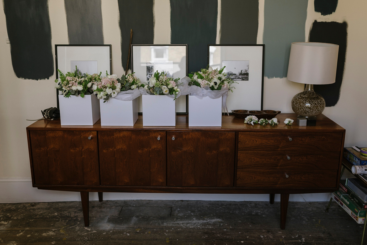 Ruth wore a J.Crew dress for her modern, cool, London warehouse wedding. Photography by Thierry Joubert.