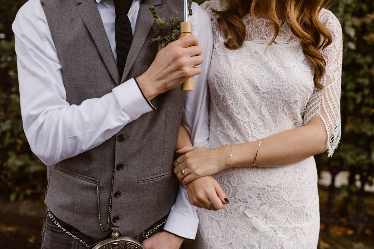 Katie wore a For Love & Lemons dress for her cool, modern, warehouse wedding in Glasgow. Photography by The Curries.