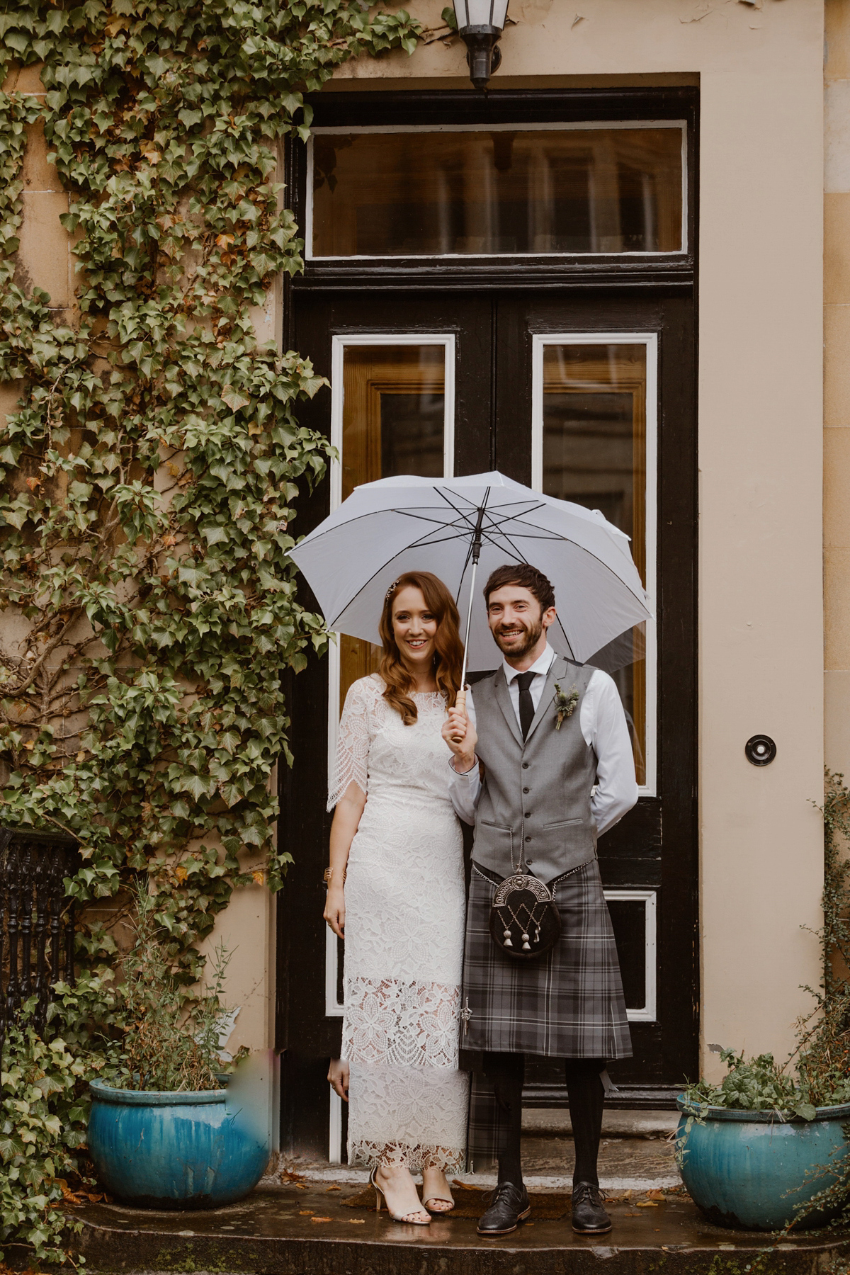 Katie wore a For Love & Lemons dress for her cool, modern, warehouse wedding in Glasgow. Photography by The Curries.