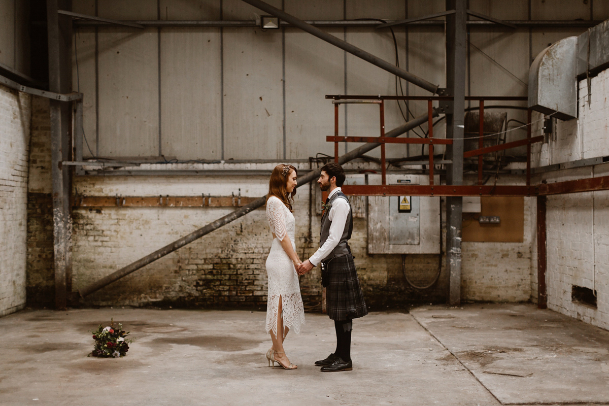 Katie wore a For Love & Lemons dress for her cool, modern, warehouse wedding in Glasgow. Photography by The Curries.