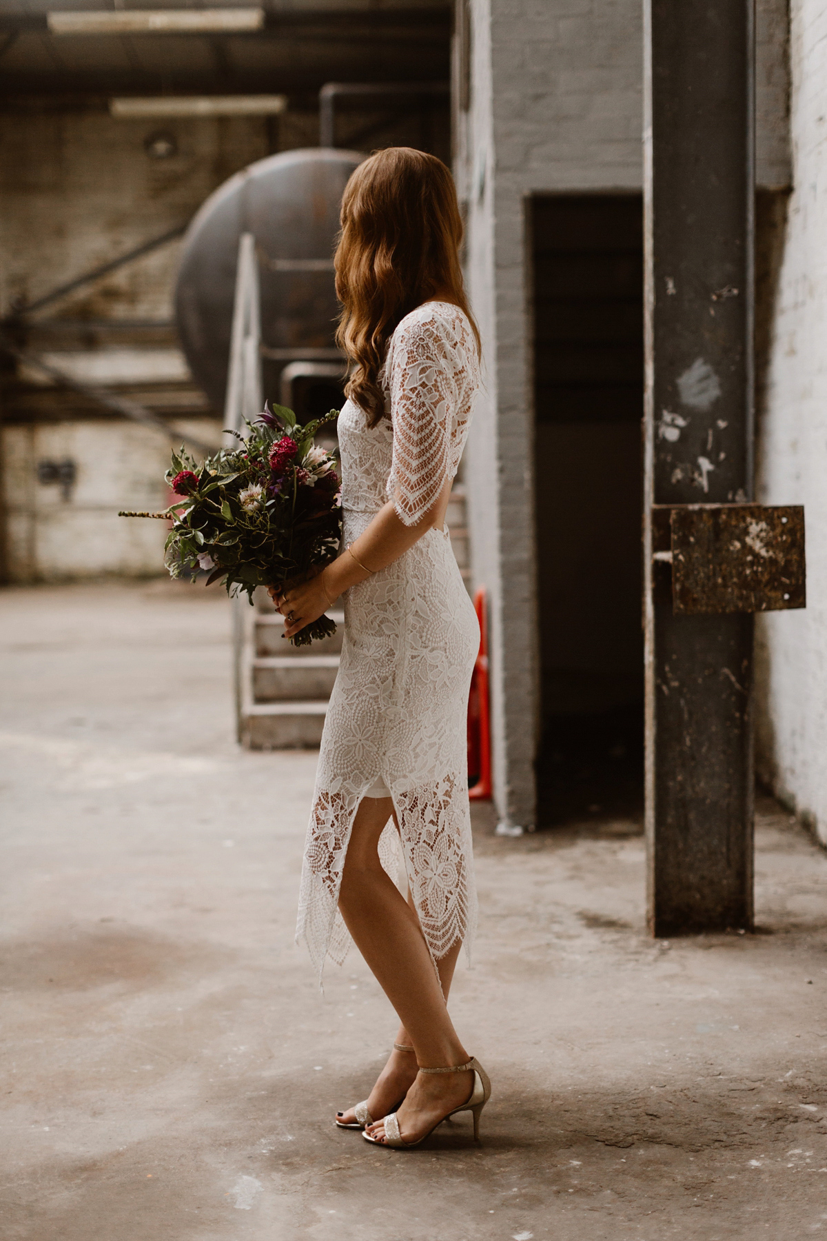 Katie wore a For Love & Lemons dress for her cool, modern, warehouse wedding in Glasgow. Photography by The Curries.