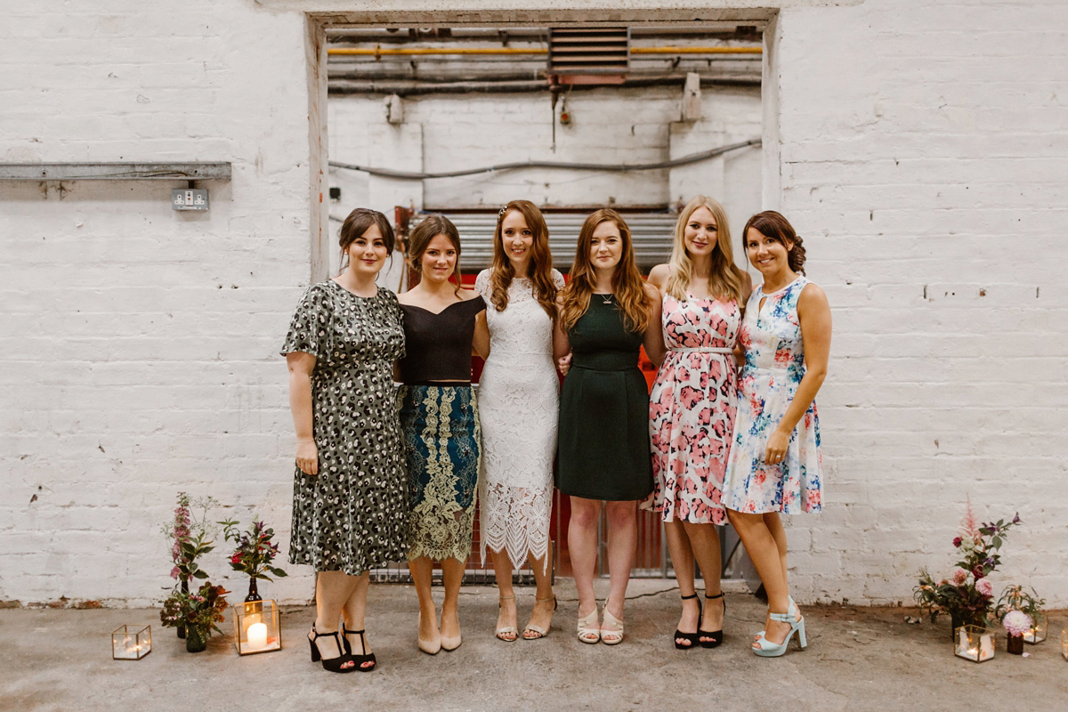 Katie wore a For Love & Lemons dress for her cool, modern, warehouse wedding in Glasgow. Photography by The Curries.