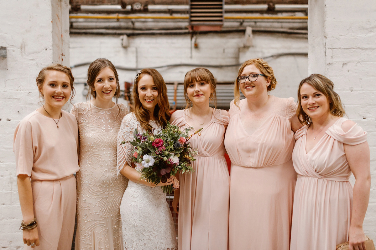 Katie wore a For Love & Lemons dress for her cool, modern, warehouse wedding in Glasgow. Photography by The Curries.