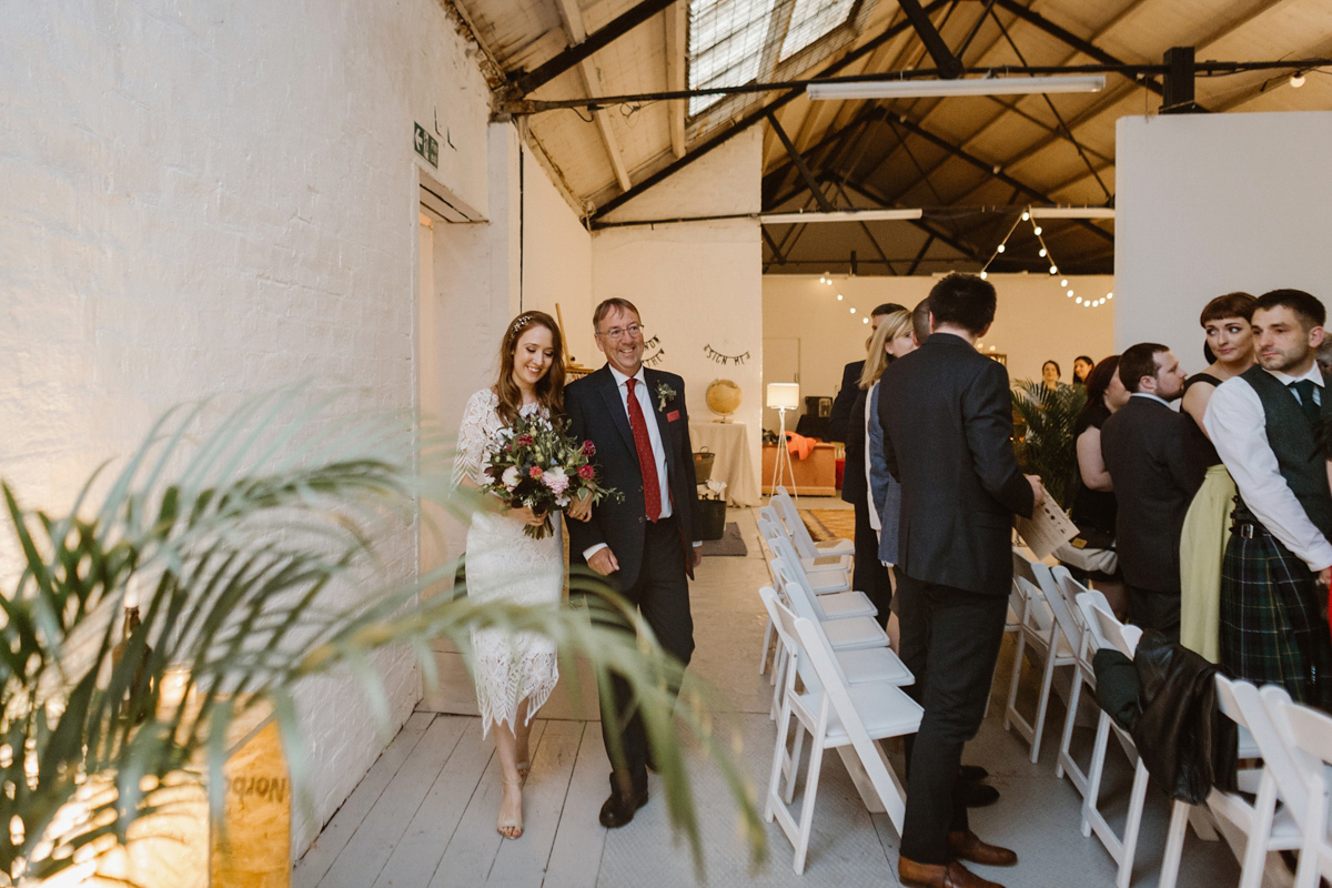 Katie wore a For Love & Lemons dress for her cool, modern, warehouse wedding in Glasgow. Photography by The Curries.