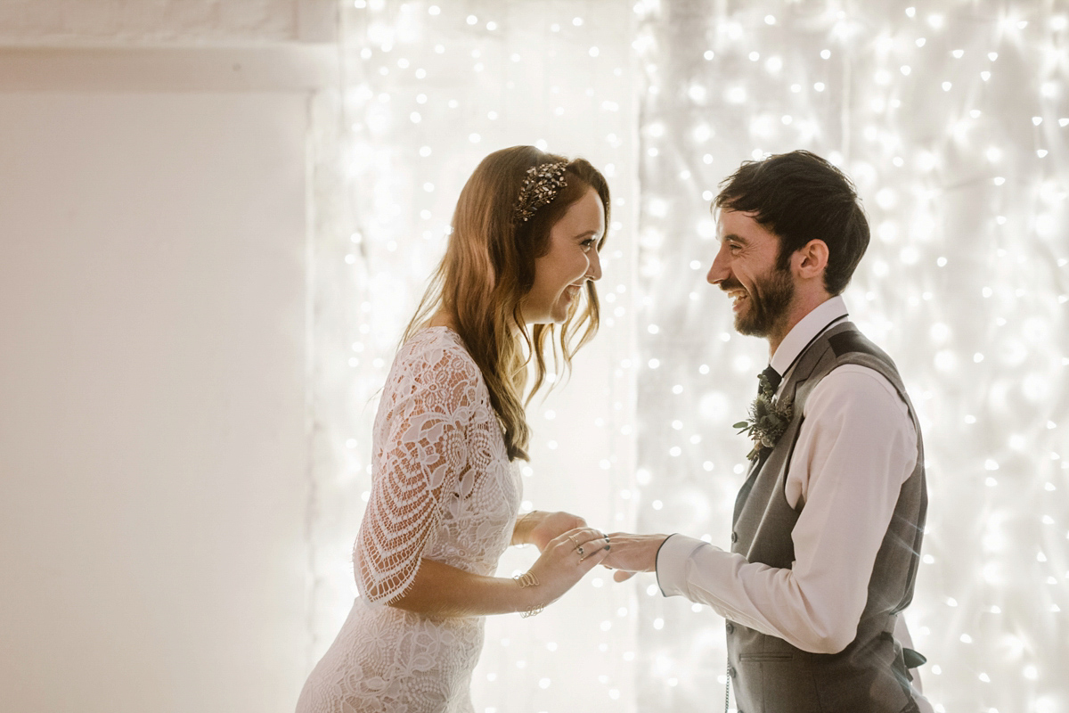 Katie wore a For Love & Lemons dress for her cool, modern, warehouse wedding in Glasgow. Photography by The Curries.