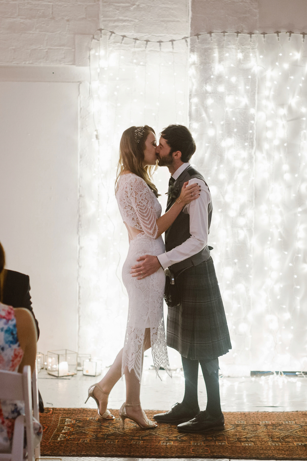 Katie wore a For Love & Lemons dress for her cool, modern, warehouse wedding in Glasgow. Photography by The Curries.