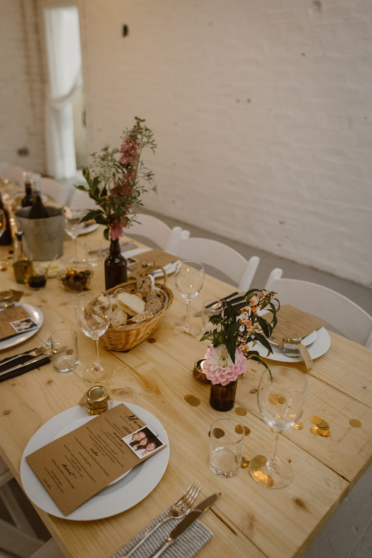 Katie wore a For Love & Lemons dress for her cool, modern, warehouse wedding in Glasgow. Photography by The Curries.