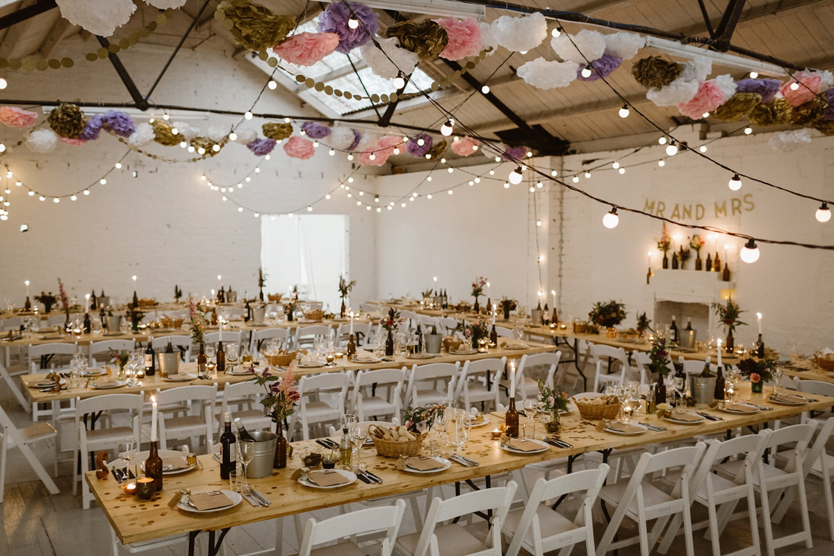 Katie wore a For Love & Lemons dress for her cool, modern, warehouse wedding in Glasgow. Photography by The Curries.